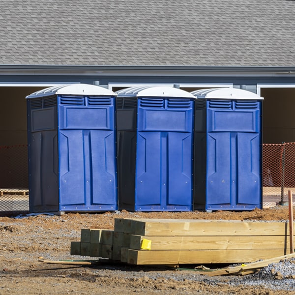 what is the cost difference between standard and deluxe portable toilet rentals in Bitter Springs